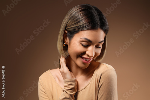 Stylish young woman with sh...