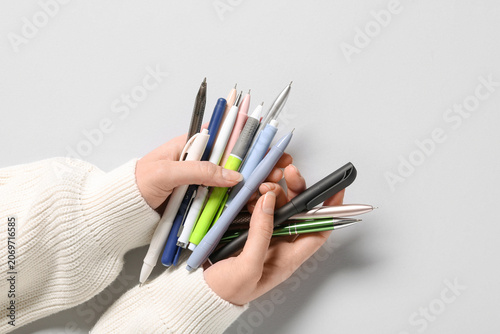 Female hands with many diff...