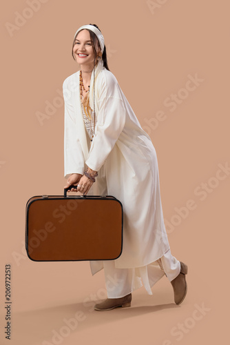 Young happy female hippie w...