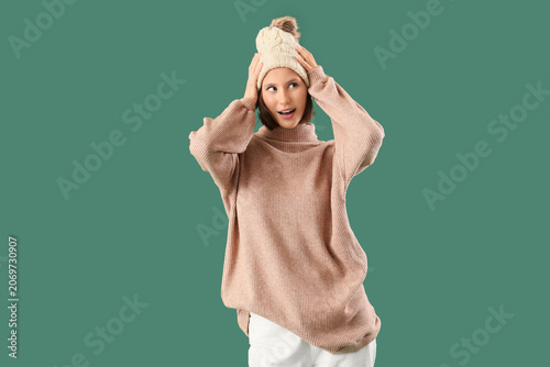 Young woman in warm sweater...