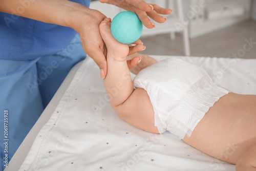 Cute little baby getting fo...