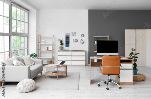 Interior of office with des...