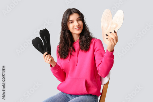 Young woman sitting on chai...