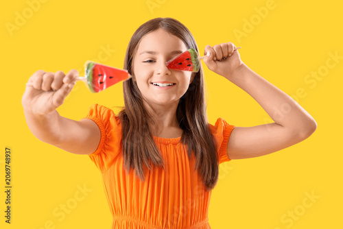 Happy little girl with loll...