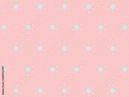 Soft seamless pattern with pale blue sun shapes evenly arranged on pastel pink background great for decor paper and textile prints