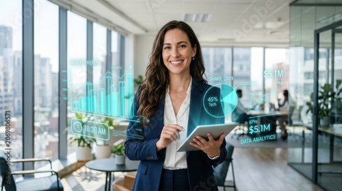 Businesswoman analyzing data on tablet with financial charts and graphs in modern office environment
