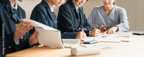 Elementary school students, junior high school students, high school students, and female high school students who receive instruction from teachers, instructors, or tutors in school classes or cram s