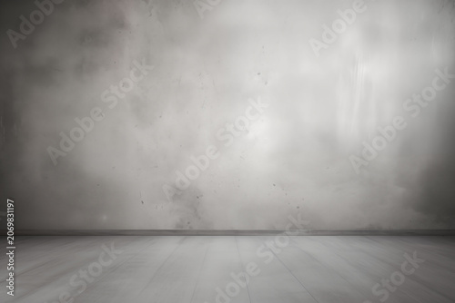 A cool, light gray background with a minimalist blur effect.