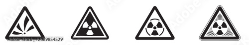 Fotografi Four warning signs with biohazard, radiation, and other hazard symbols isolated
