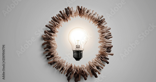 a symbolic image featuring many hands of diverse skin tones forming the shape of a glowing light bulb against a light gray gradient background