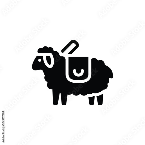 Obraz na plátně Stylized black silhouette of a sheep with fluffy wool and a saddle, presented as