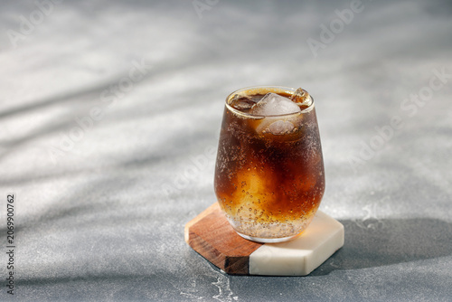 Espresso tonic. Trendy coffee drink in glass