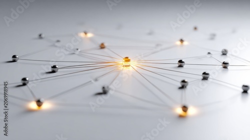 A glowing golden sphere at the center of a network of connected silver spheres, representing a hub of connectivity and data flow