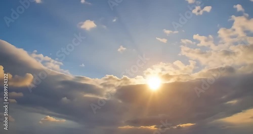 Sunrise above clouds with warm light and serene atmosphere
