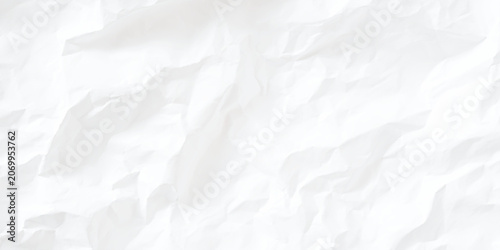 Photos Crumpled white paper texture with irregular folds and creases all over the surfa
