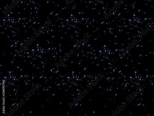 Fotografie A pattern of small, scattered blue specks on a black background, resembling a starry sky or splattered paint