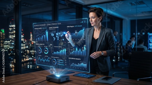 Business woman using advanced digital analytics strategy for corporate growth and financial planning with futuristic holographic data dashboard interface in modern office at night city view.