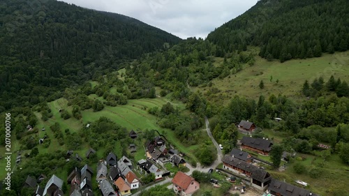 Drone Shot of Traditional Vlkolínec Village with Scenic Valleys and Mountain Landscape in Slovakia