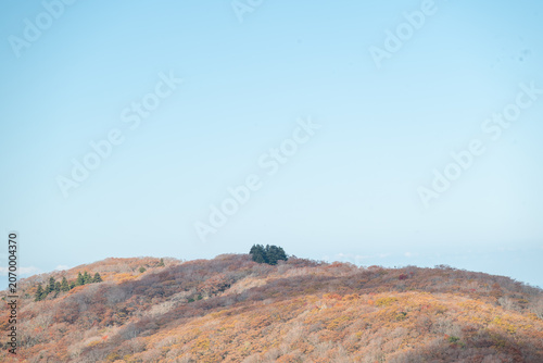 Distant mountain peak under clear blue sky