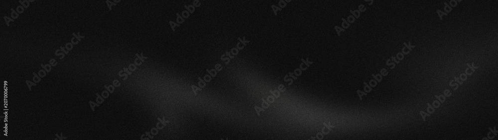 Fototapeta premium Black brushed metal texture background with subtle light streaks and grainy details, abstract industrial surface for sophisticated design projects.