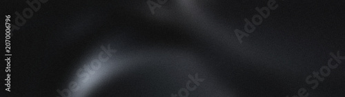 Cuadro en lienzo Dark grey wrinkled fabric texture with soft light illuminating its folds, elegant textile background for fashion and interior design concepts