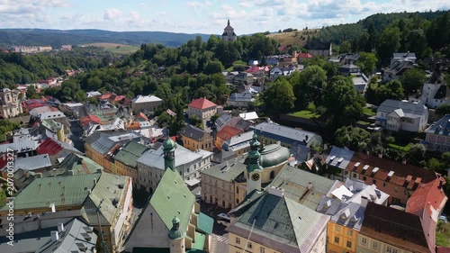 Aerial View of Banska Stiavnica with New Castle, Historic Square, Forests and Hills