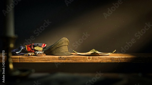 Military remembrance display with folded flag and fallen soldier tribute