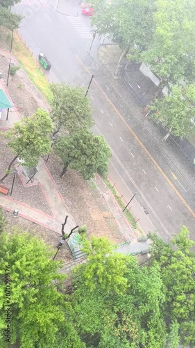 Vertical Shot. Urban rain street for weather alerts and mobile ads