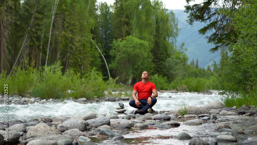 Bild auf Leinwand A man travels through the Altai Mountains