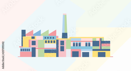 Industrial factory building with smokestack.