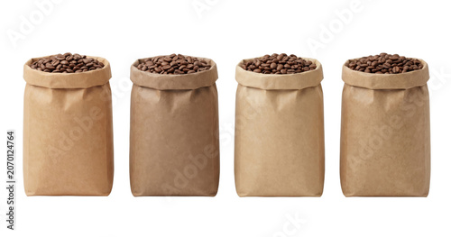 Four rustic paper bags overflowing with freshly roasted coffee beans isolated on transparent background.