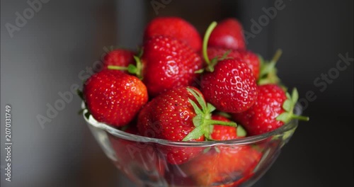 Red ripe strawberries laid out on a dessert plate. Fruit dessert. Natural vitamins.