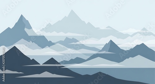 Majestic snow capped mountain peaks against blue sky.