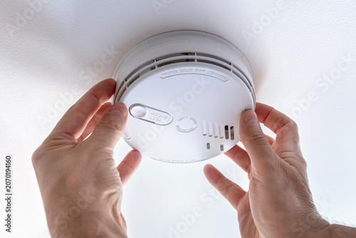 Home smoke and fire alarm detector installing, checking, testing or replace battery