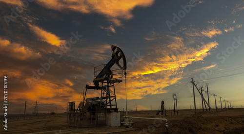 Photography An oil pump pumps crude oil in the steppes of Kazakhstan near the city of Aktau