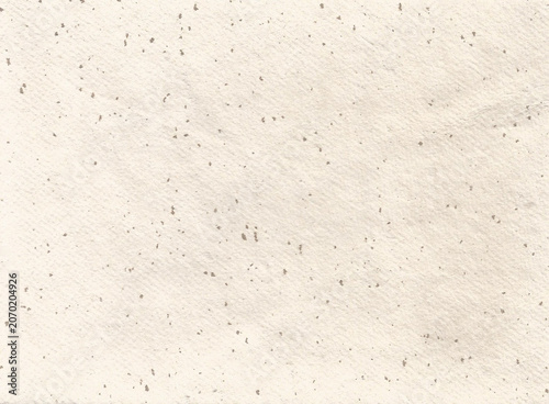 Vintage seeded cream colored handmade paper texture filled with rustic brown organic flecks and fiber inclusions. High-detail macro background surface optimized for eco-friendly branding, craft.