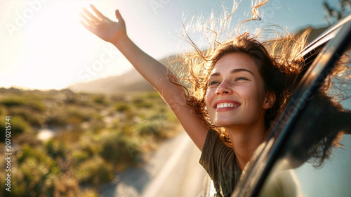 Happy Young Woman Enjoying Freedom on a Road Trip