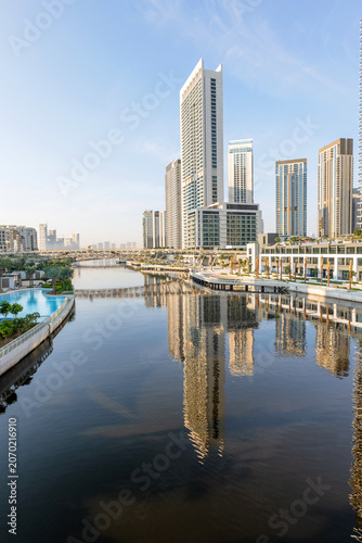 Scenic waterfront view at Dubai Creek Harbour with modern skyline, promenades and landscaped public areas attracting visitors and residents