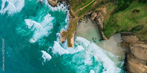 Tableau sur toile Aerial view of cliffs and coastline with unusual rocks, New Zealand's tunnel coa