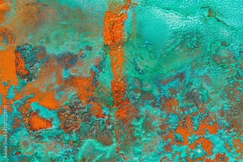 фотографія Vibrant copper patina texture with turquoise verdigris and oxidized metal surface