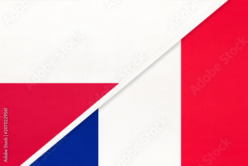 Poland and France national flags on fabric background, international partnership and cooperation between two countries