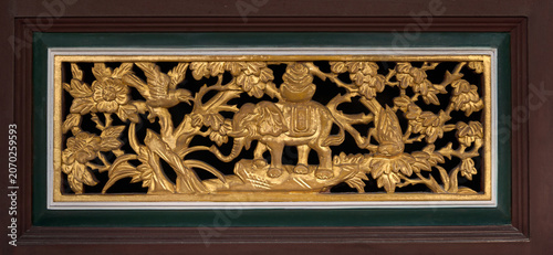 Antique Chinese Gold Leaf Wooden Carving Featuring Elephant Carrying Gold Ingot