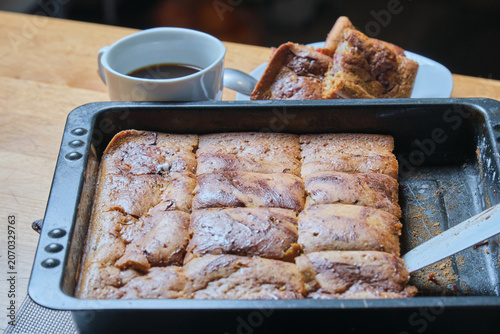 Delicious crumb cake with berries and fruit topping. Homestyle berry dessert featuring fresh berries on rustic table scene