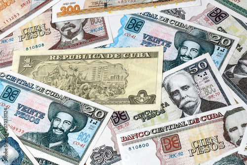 Photos Cuban peso money bills in pile on table