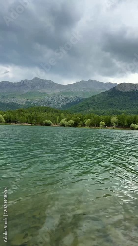 Picturesque Nature Timelapse: Rippling Pond, Fishing, and Forest Landscape