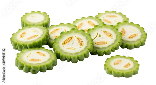 Fresh bitter melon slices showcasing interior texture and vibrant green color transparent background