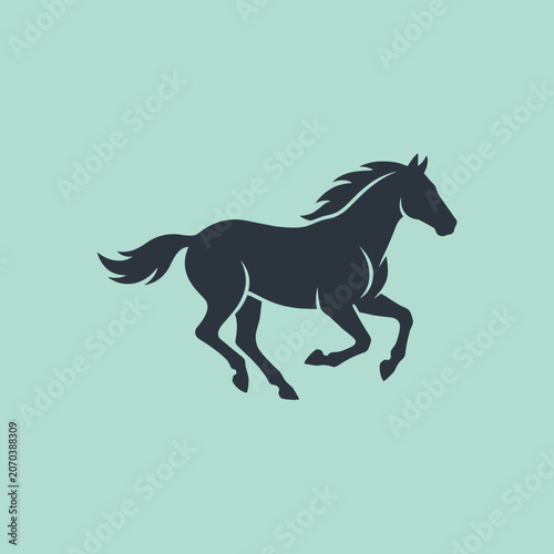 A dark silhouette of a wild horse galloping fast