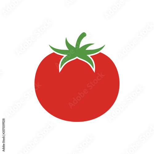 Fotografie A bright red tomato rests on a white background, gleaming