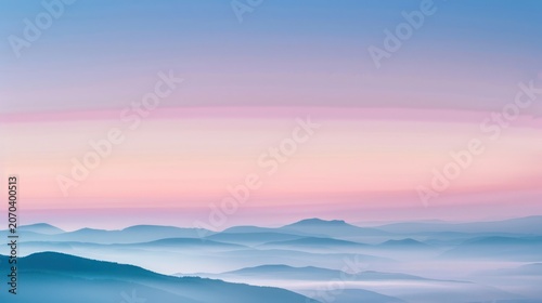 Serene Mountain Landscape with Pink and Blue Sky During Sunrise