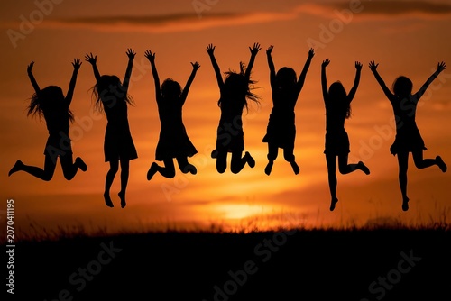Work Life Joy, Colleagues jump outdoors under warm sunlight, reflecting work-life balance, joy, and a healthy lifestyle.